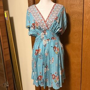 Maurice’s Floral V-Neck Skater Dress in turquoise. Extremely flattering new!